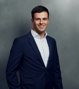 Meet the Team of experts - Photo of Christian Classen, person in business suit, smiling, male, gallantly, standing upright