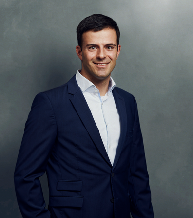 Meet the Team of experts - Photo of Christian Classen, person in business suit, smiling, male, gallantly, standing upright