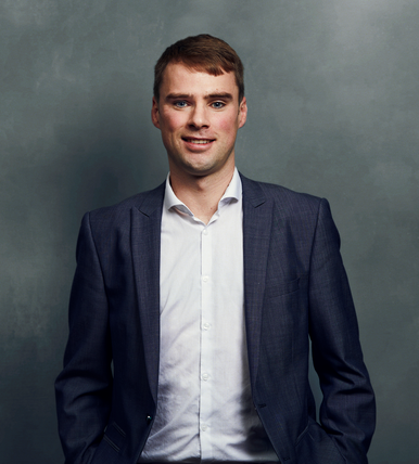 Meet the Team of experts - Photo of Pádraic Burke, person in business suit, smiling, male, gallantly, standing upright