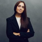 Meet the Team of experts - Photo of Natacha Espelta, person in business suit, smiling, female, gallantly, crossed arms