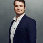 Meet the Team of experts - Photo of Juraj Siska, person in business suit, smiling, male, gallantly, standing upright